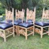 A 20th Century Set of Eight Carved and Bleached Oak Dining Chairs Upholstered in Leather - Image 5