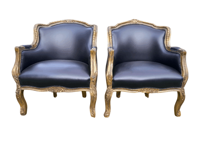 A 20th Century French Style Pair Of Carved Gilt Wood Armchairs