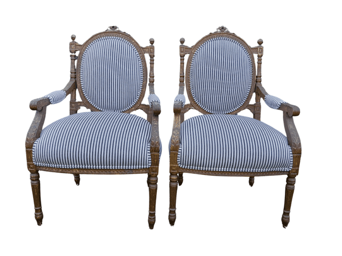 A Pair of 20th Century French Louis XV Style Gilded Armchairs Upholstered in a Ticking Fabric