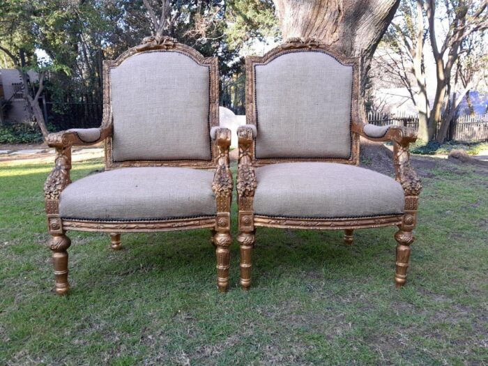 An Antique 19th Century French Pair of  Louis XV Style Heavily Carved Giltwood Armchairs - Image 2