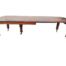 An Antique Victorian Oak Dining Table on Porcelain Castors with Two Leaves