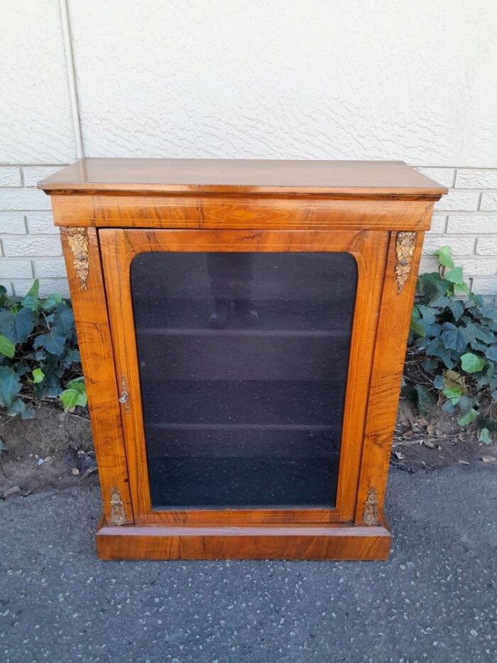 An Antique Victorian Walnut Cabinet with Metal Mounts and Glass Door - Image 2