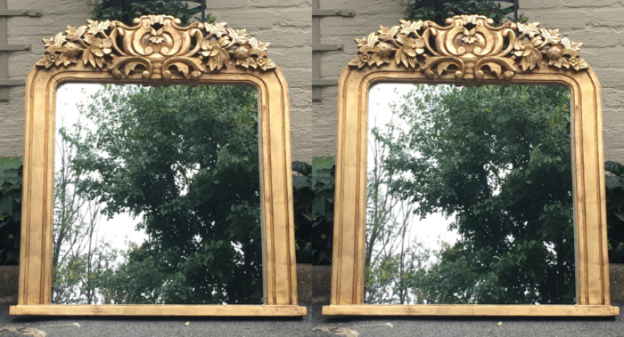 A 20TH Century Pair of Hand Carved and Gilded Designer Mirrors