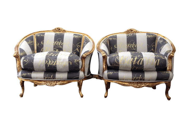 Pair Oversized French Bergere syle gilded armchairs hand gilded in  gold leaf upholstered with handmade fabric