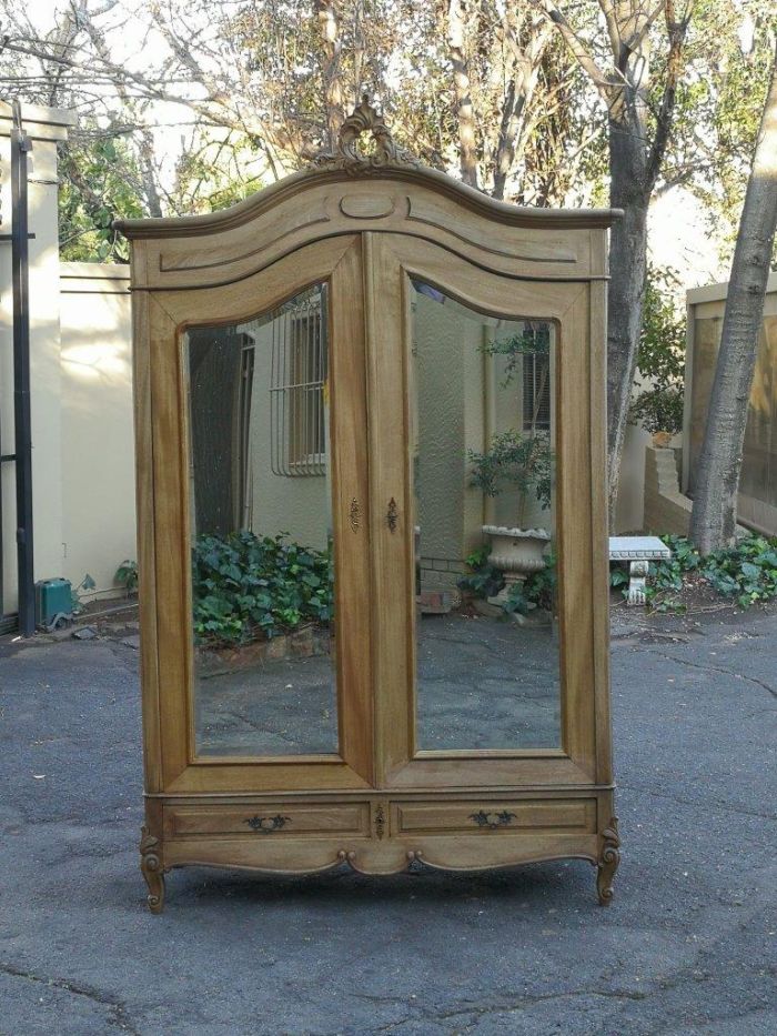 A 20th Century French Rococo Style Armoire with Bevelled Mirrors and Drawers finished in a contemporary Bleached / Natural Wood - Image 2
