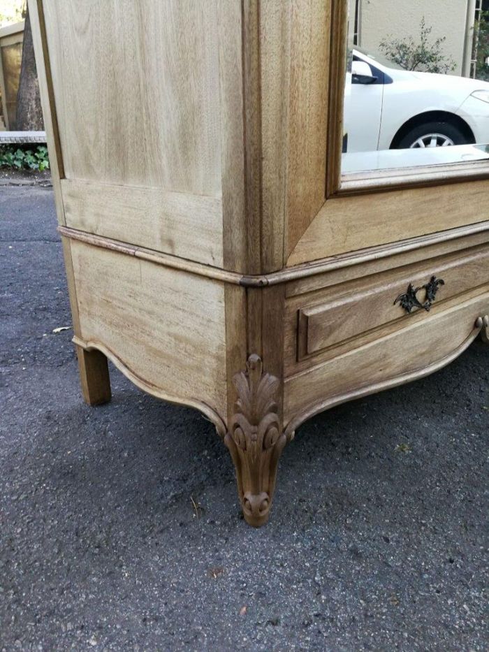 A 20th Century French Rococo Style Armoire with Bevelled Mirrors and Drawers finished in a contemporary Bleached / Natural Wood - Image 4