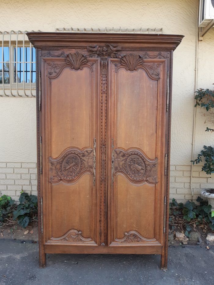 A French Provincial styled Ornately carved Armoire - Image 2