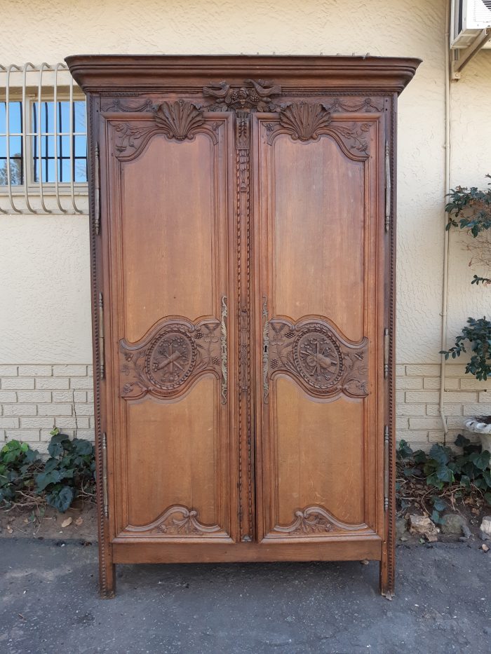 A French Provincial styled Ornately carved Armoire - Image 3