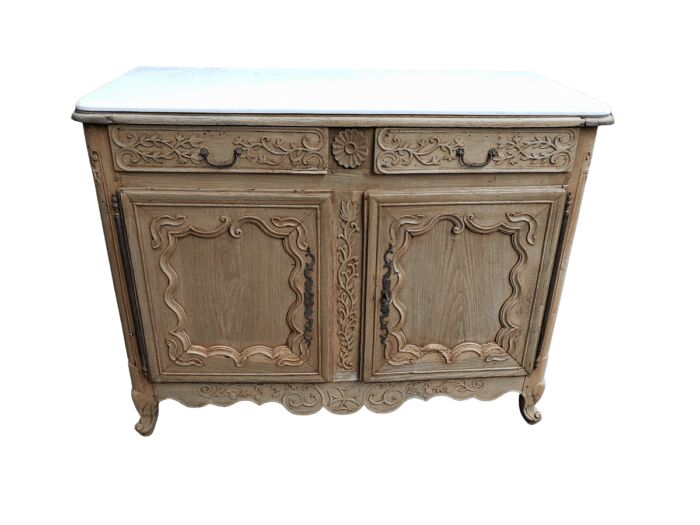 A Provincial Style French Oak Server in a Contemporary Bleached / Natural Wood Finish with Cream Marble Top