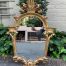 Ornately carved and gilded mirror