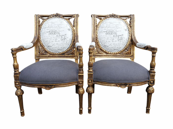 An Exceptional Pair of French Style Carved and Gilded Armchairs Upholstered in a Custom-Made Linen for The Crown Collection ND