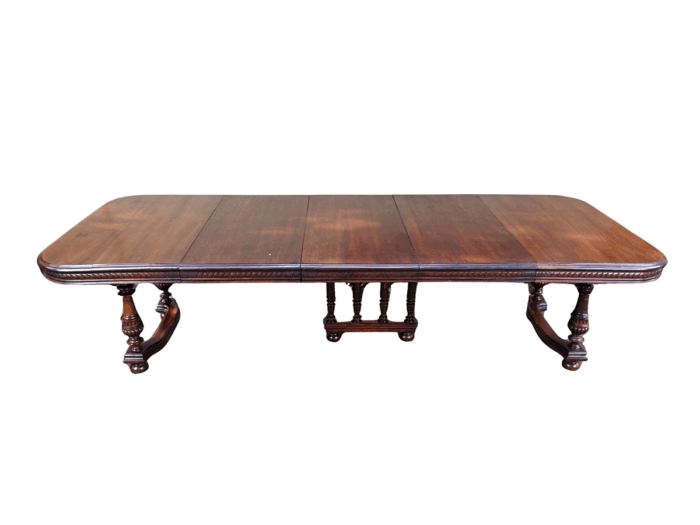 Renaissance Henry II dining table with carved and turned legs and a middle stretcher. Late 19th century table (10-12-Seater) With 3 Leaves