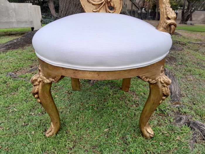 A Pair of Baroque Style Carved and Hand Gilded High Back Throne Chairs (upholstered in white) - Image 5