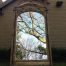 An Ornate Carved & Bevelled Mirror