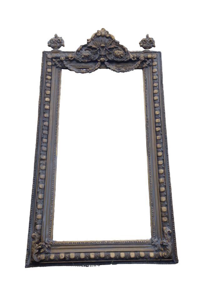 An Ornate Carved Painted Mirror