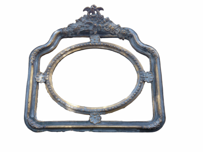 A French Ornate carved painted mirror with a bevelled centre section