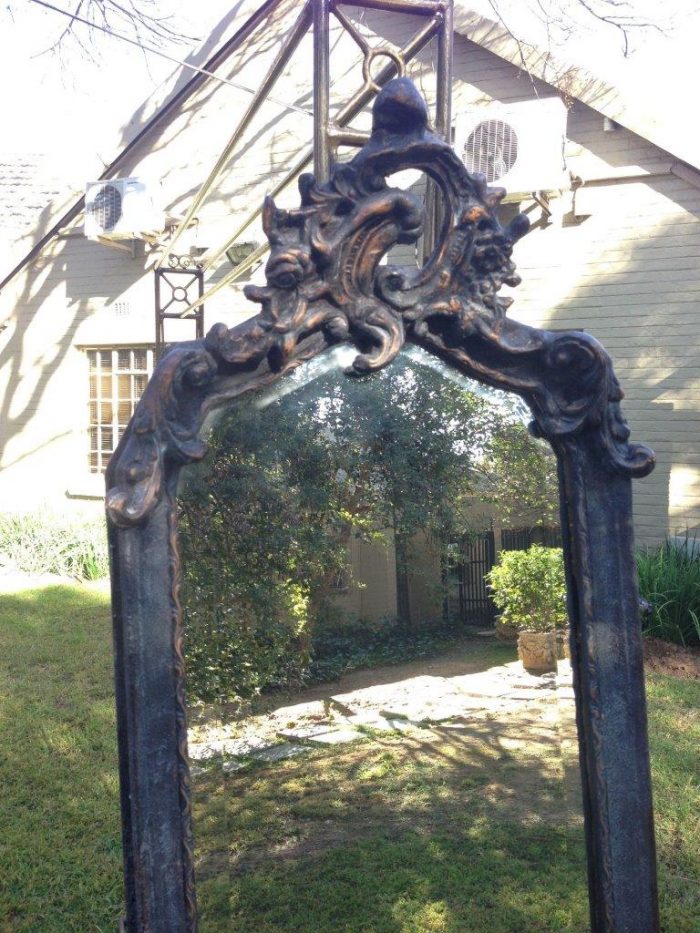 An Ornate Carved Gilded Mirror in the Rococo Style - Image 5