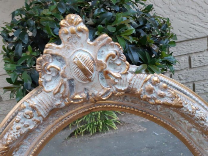 An Oval Ornate Bevelled Mirror - Image 4