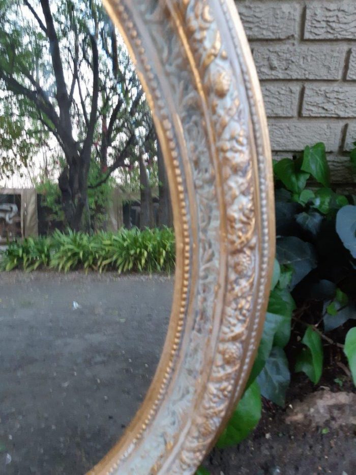 An Oval Ornate Bevelled Mirror - Image 5