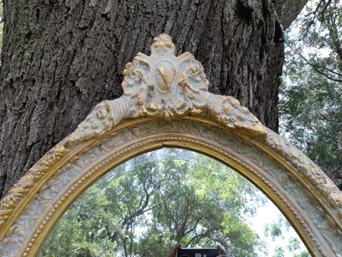 An Oval Ornate Bevelled Mirror - Image 8
