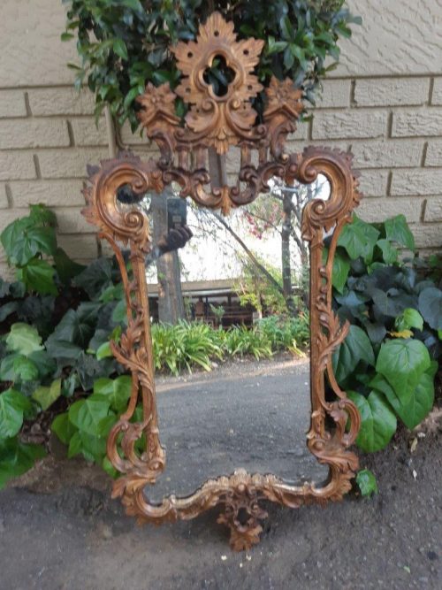 Gilt And Carved Wooden Mirror