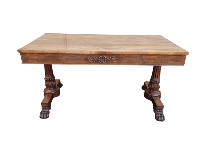 A William IV Rosewood Library Table With Brass Castors
