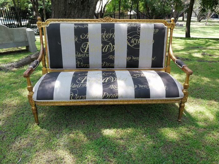 A 20th Century French Style Ornate Hand-Carved and Gilded Settee / Sofa Upholstered in a Custom-made Imported Fabric for The Crown Collection