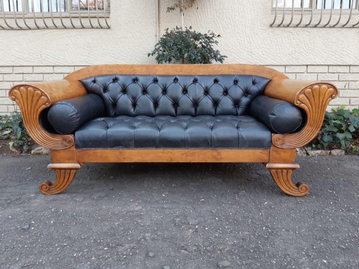 A Biedermeier Settee Covered in Leather and Deep Buttoned Circa Early 20th Century