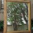A Massive And Ornately Framed Gilded Mirror With Bevelled Mirror - Nd
