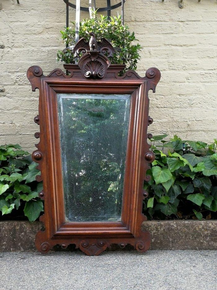 Early 19th Century And Very Rare Bevelled Carved Wooden Mirror Surmounted By A Federal Eagle