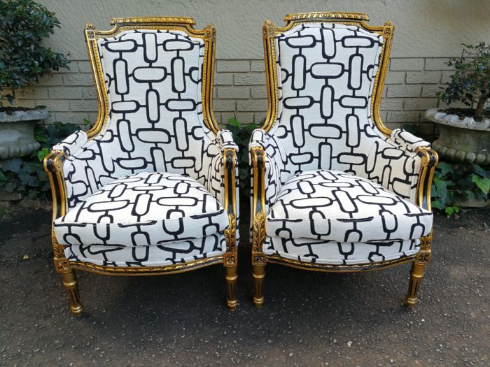 A Pair of Late 19th Century French Bergere Chairs Hand Gilded with Gold Leaf and Upholstered in in a Geometric Cotton/Linen Mix - Image 2