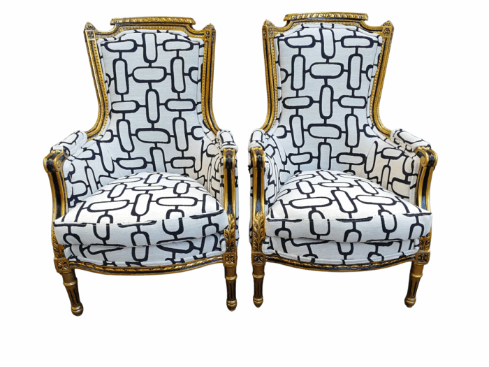 A Pair of Late 19th Century French Bergere Chairs Hand Gilded with Gold Leaf and Upholstered in in a Geometric Cotton/Linen Mix