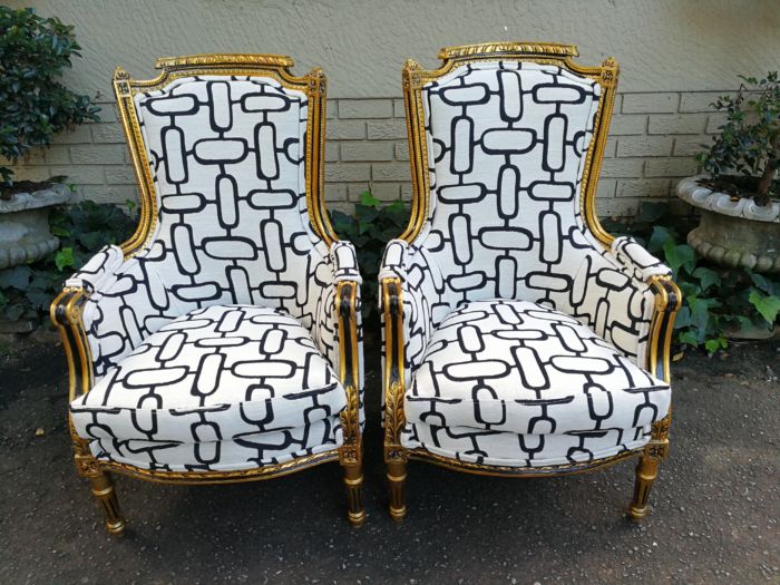 A Pair of Late 19th Century French Bergere Chairs Hand Gilded with Gold Leaf and Upholstered in in a Geometric Cotton/Linen Mix - Image 3