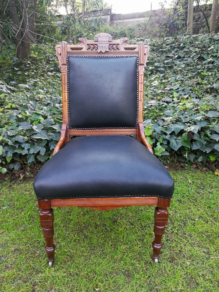 A Late 19th Century Pair of Victorian Carved Walnut Chairs Upholstered in Leather on Casters - Image 5