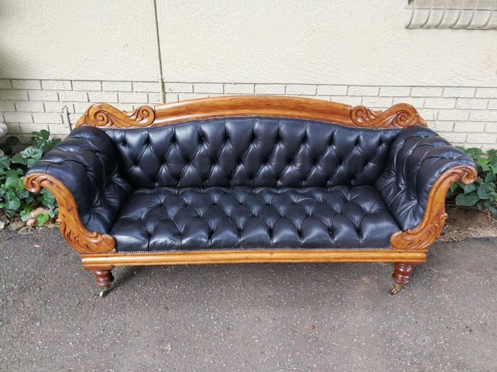 Victorian Mahogany Settee Upholstered In Deep-Buttoned Leather. Original Porcelain Casters - Image 2
