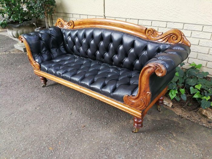 Victorian Mahogany Settee Upholstered In Deep-Buttoned Leather. Original Porcelain Casters - Image 3