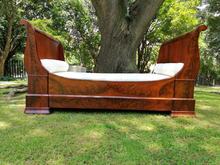 A French Flame Mahogany Lit-En-Bateau / Daybed on Wooden Castors. Circa 1950 - Image 2