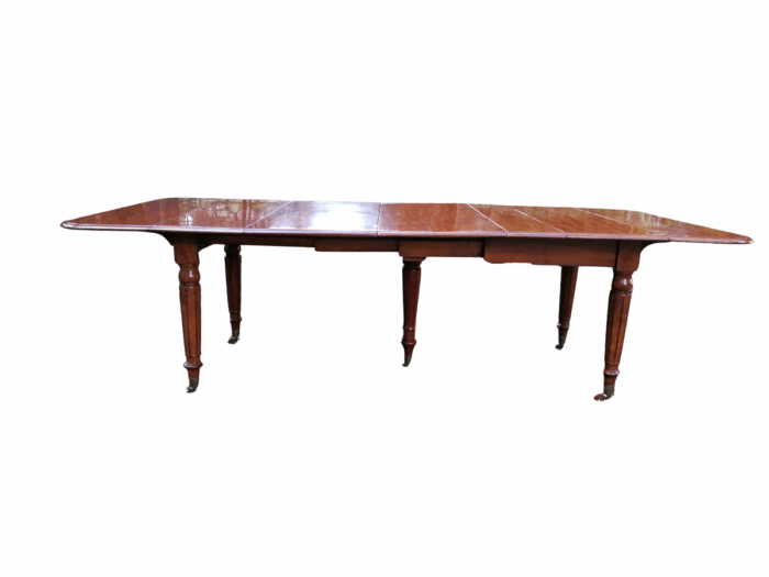 A 19th Century Mahogany Extending Dining Table On Castors (10 Seater)
