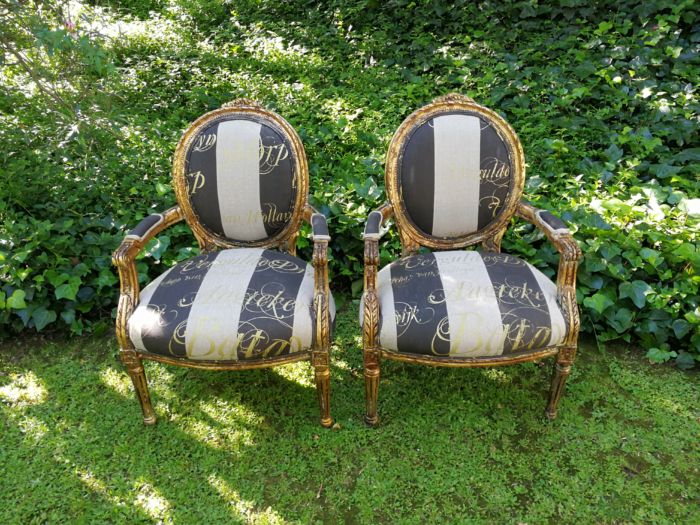 A Pair of French Style Arm Chairs Hand Gilded With Gold Leaf And Upholstered In an Imported Script Fabric - Image 3