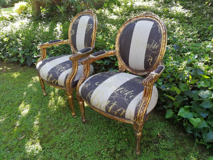 A Pair of French Style Arm Chairs Hand Gilded With Gold Leaf And Upholstered In an Imported Script Fabric - Image 5