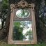 Ornately Carved Oval Gilded Mirror