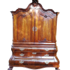 An 18th century (circa 1770) Dutch mahogany cabinet on bombe base/armoire with the original brass handles and lock plates