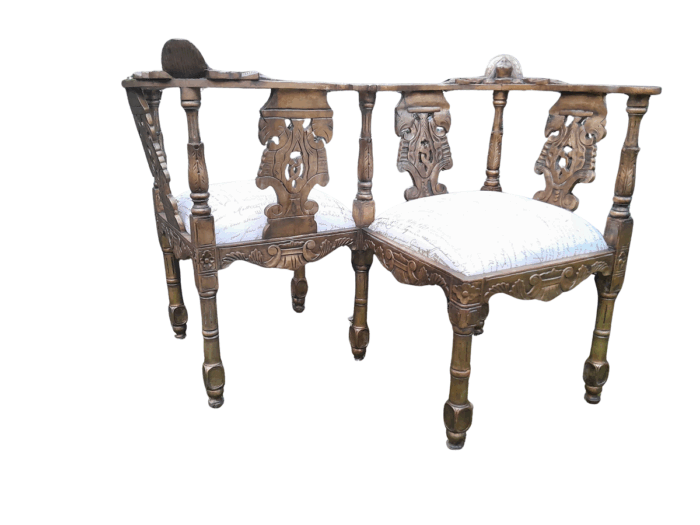 An Antique French-Style Carved Conversation Settee Hand-Gilded and Upholstered in a Custom-made Script Linen Fabric