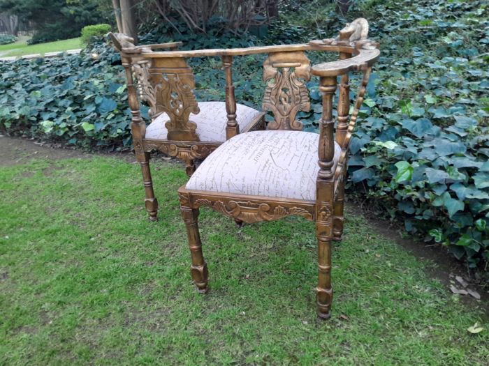 An Antique French-Style Carved Conversation Settee Hand-Gilded and Upholstered in a Custom-made Script Linen Fabric - Image 3
