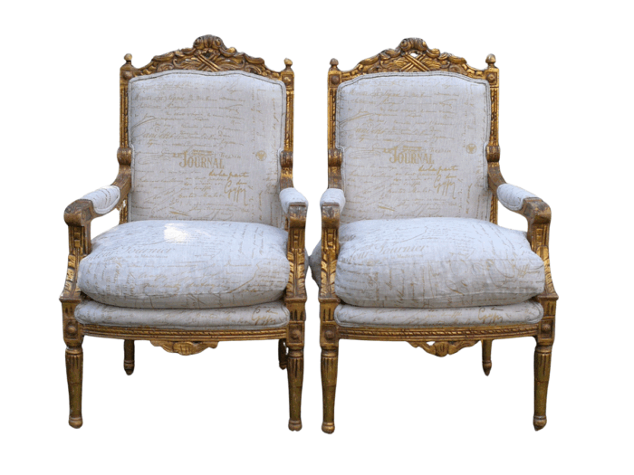 Pair of 19th Century style gilded and carved armchairs