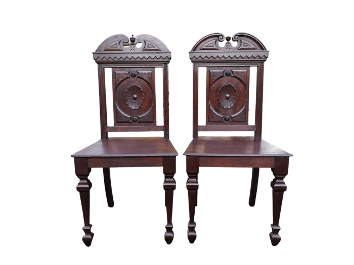 A Pair Of Victorian Mahogany Hall Chairs