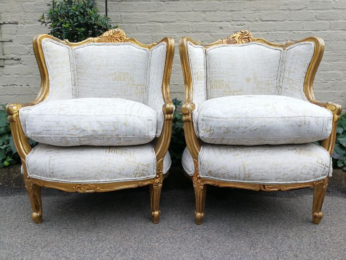 A Pair Of 20th Century French Style Gilt Bergere Armchairs Upholstered In A Custom-Made Hand Printed Linen With Gold Script Design By The Crown Collection - Image 2