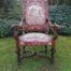A 19th Century Walnut Louis Fourteenth Style Chair Elaborately Carved And With A Splendid Original Gross Point Upholstery In Mint Condition. Chair And Embroidery  Nd