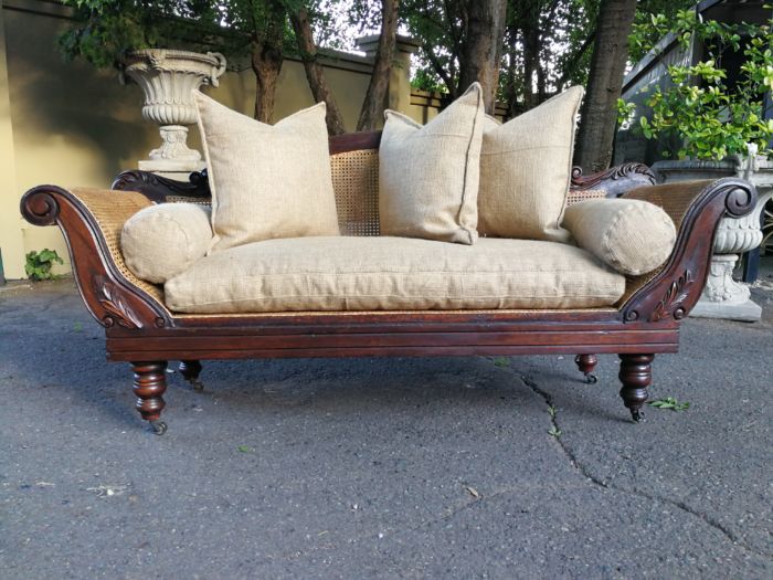An Antique Victorian Carved Mahogany and Rattan Settee On Castors with Hessian Cushions and Bolsters - Image 3