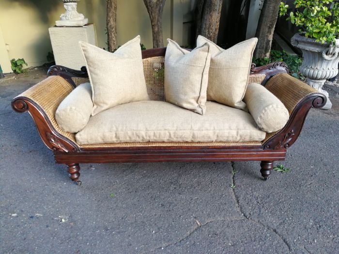 An Antique Victorian Carved Mahogany and Rattan Settee On Castors with Hessian Cushions and Bolsters - Image 4